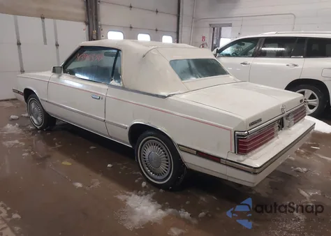 1985 Chrysler Lebaron z USA, uszkodzony, nr VIN 1C3BC55D4FG152554